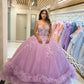 Vestidos de XV lila con mariposas