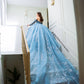 Vestido de quinceañera azul plumbago con destellos plata y cauda desmontable